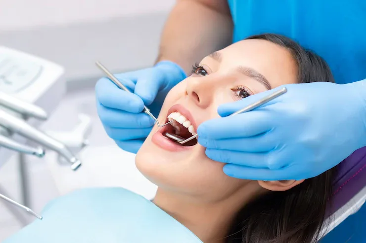 Patient having her teeth checked